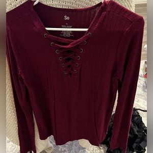 So dark red long sleeve lace-up top